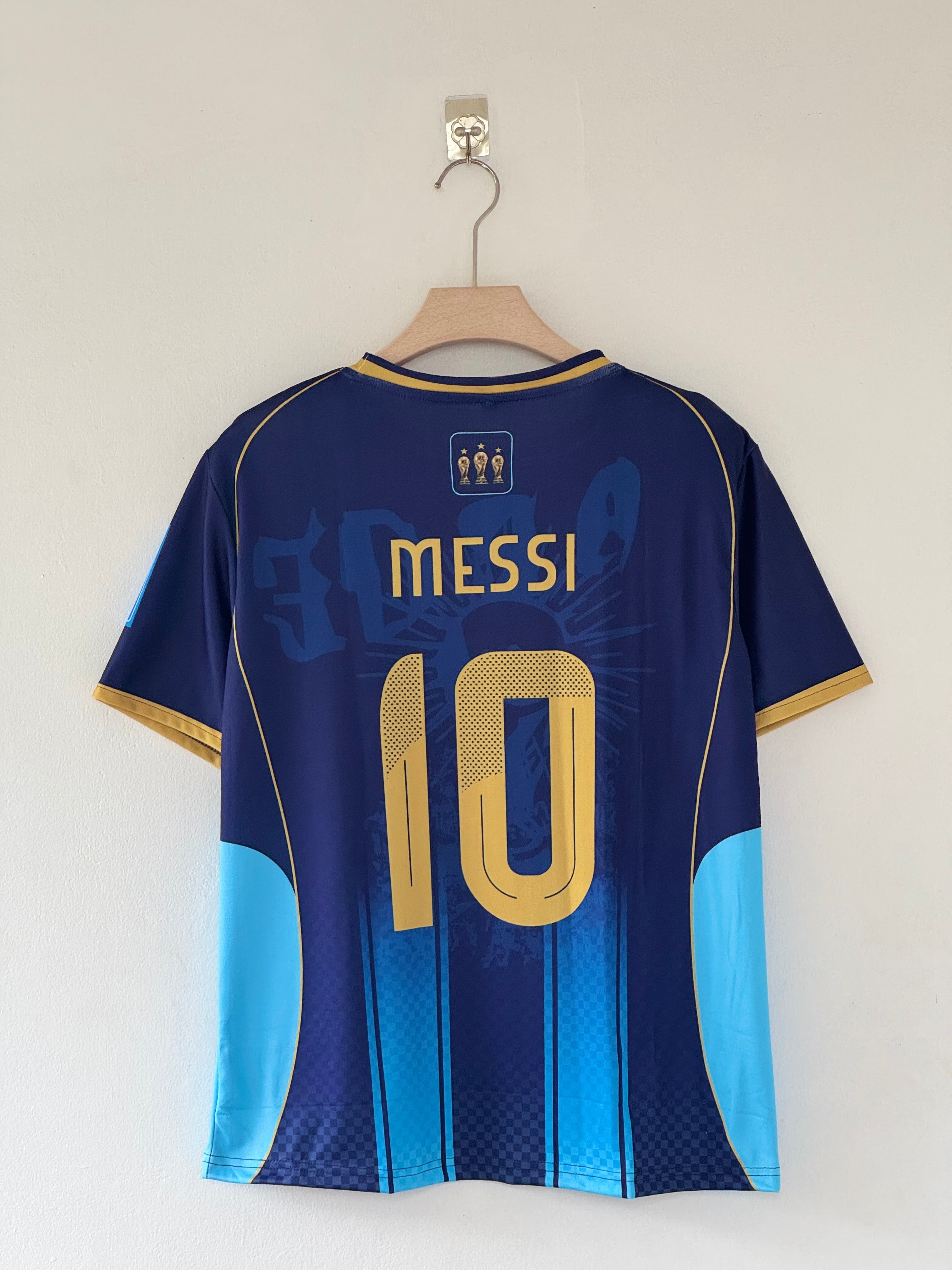 Champions Edition — Argentina Away Jersey (Navy Blue with Gold Accents)