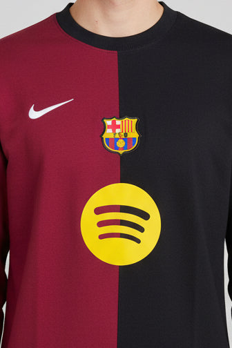 Barcelona FC crew-neck sweatshirt features a distinct split design in maroon and black