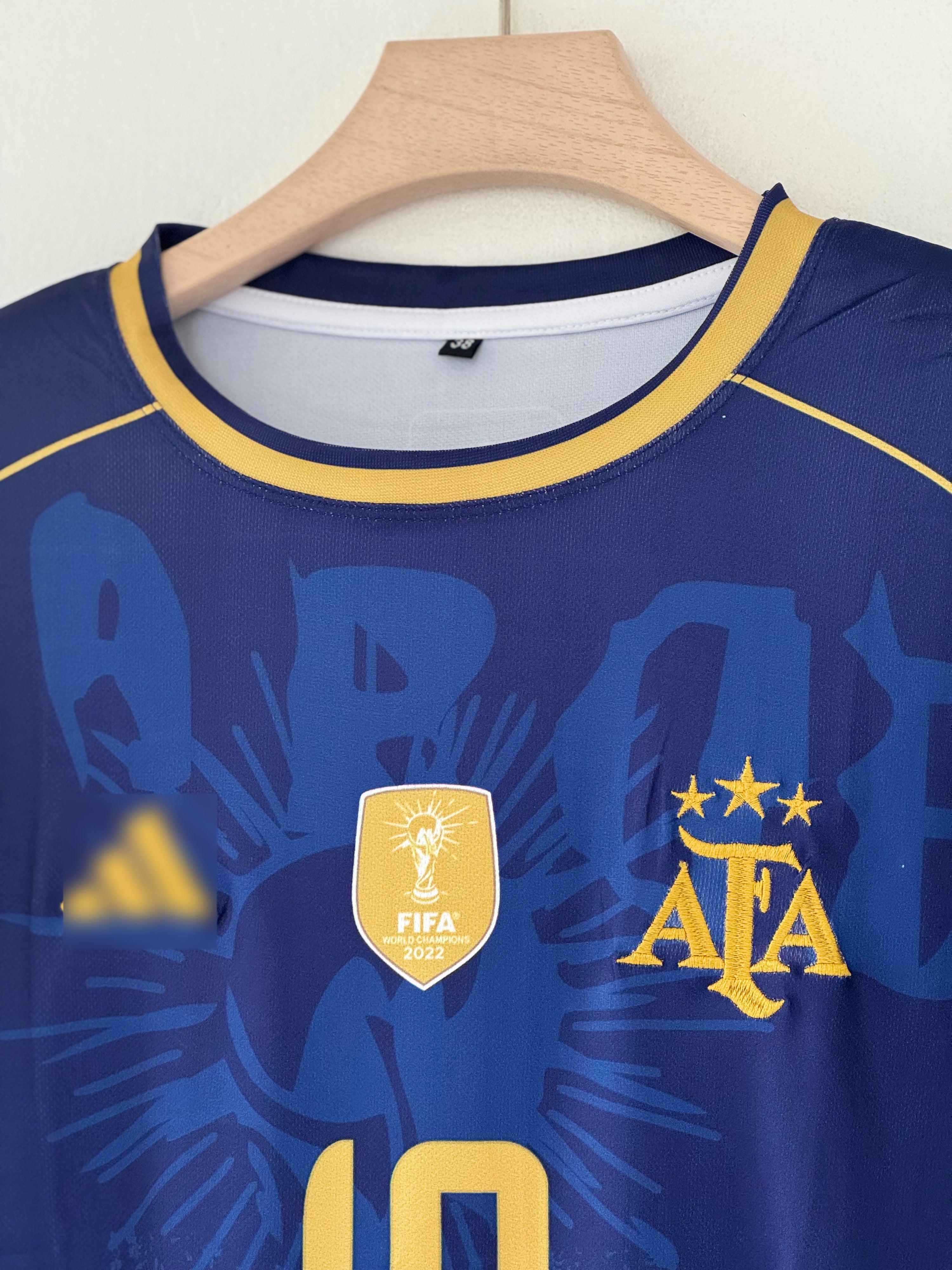 Champions Edition — Argentina Away Jersey (Navy Blue with Gold Accents)
