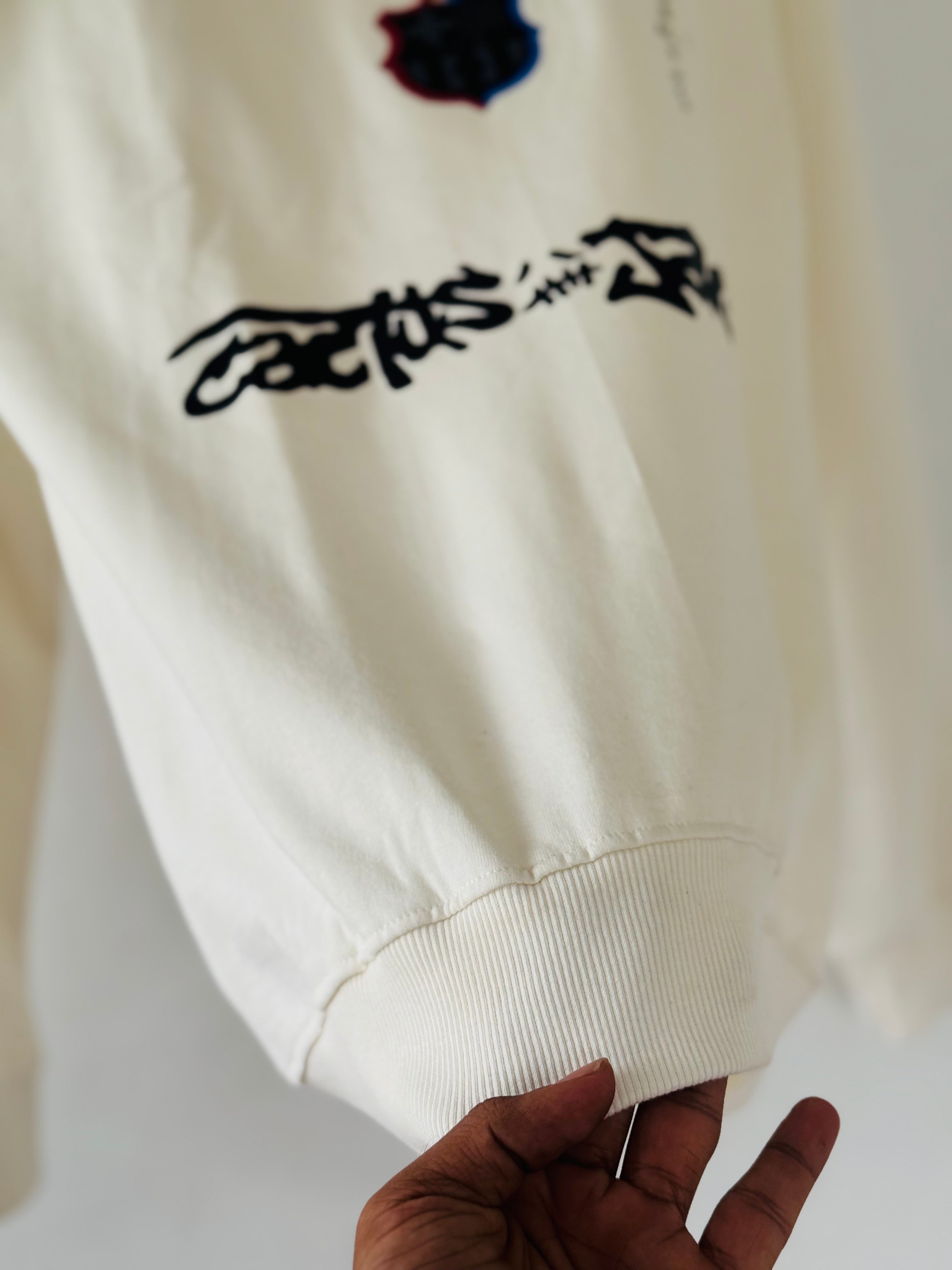 cream-colored FC Barcelona x Cactus Jack sweatshirt