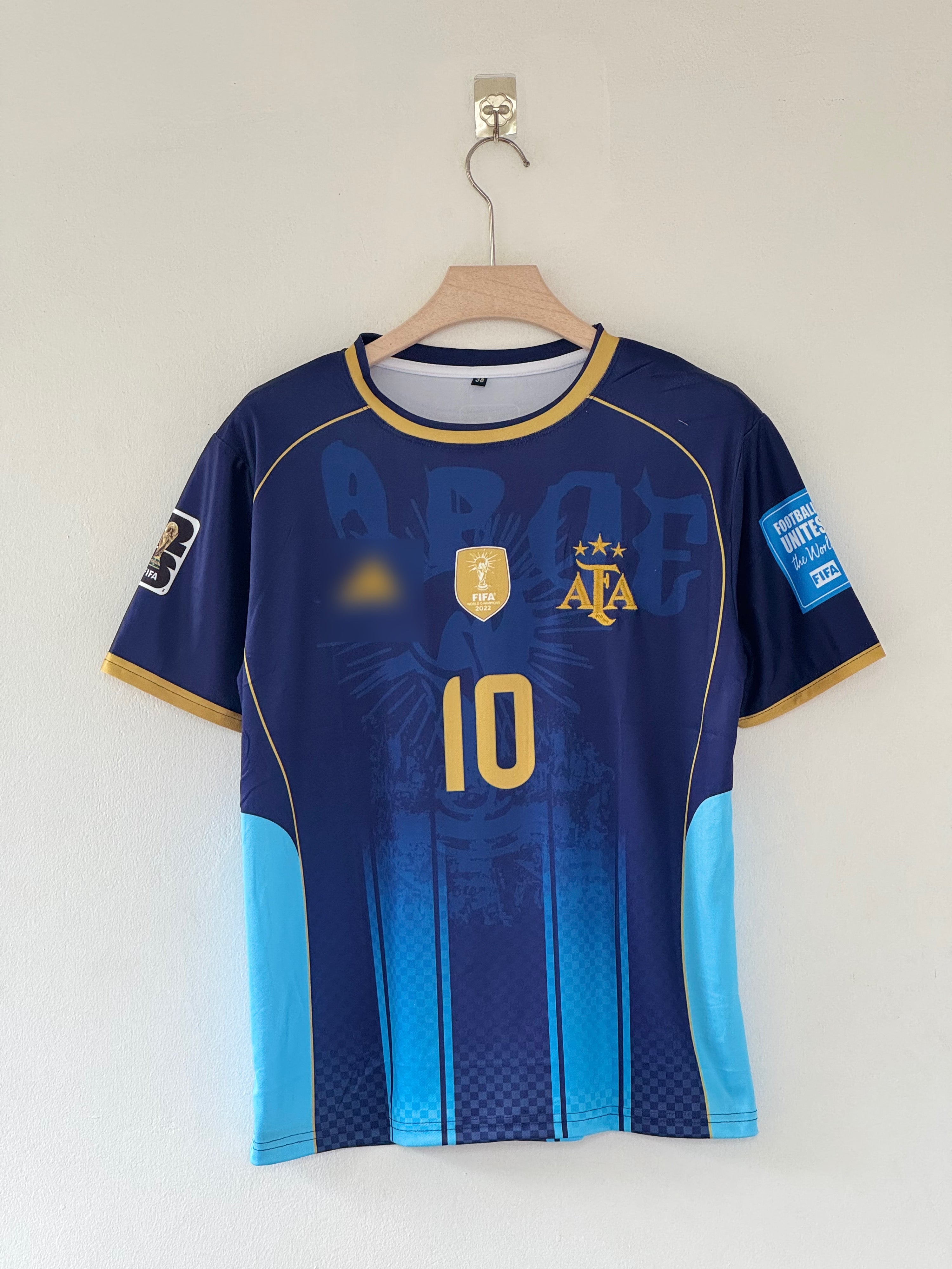 Champions Edition — Argentina Away Jersey (Navy Blue with Gold Accents)